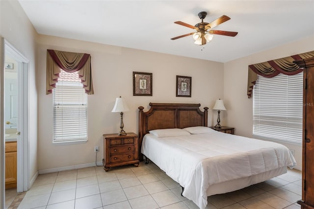 301 Rosso Dr, Davenport, FL 33837 - bedroom featuring light tile patterned floors, ceiling fan, and baseboards