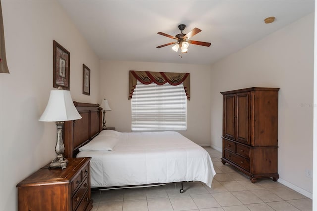 301 Rosso Dr, Davenport, FL 33837 - bedroom with light tile patterned floors, ceiling fan, and baseboards