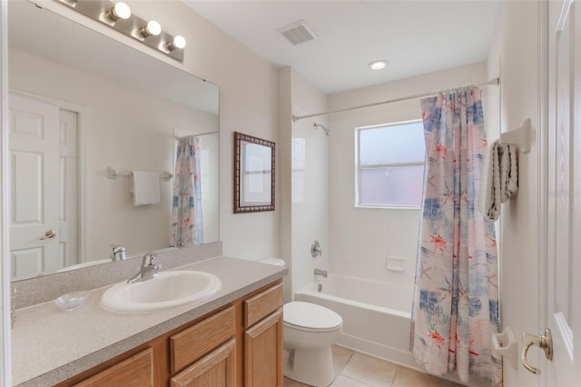 301 Rosso Dr, Davenport, FL 33837 - full bath featuring vanity, tile patterned floors, shower / tub combo, toilet, and visible vents