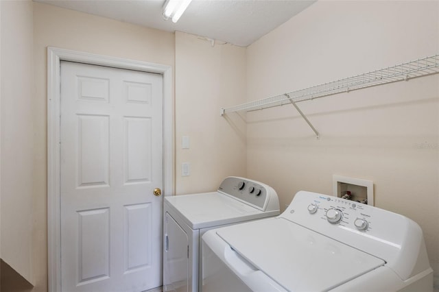 301 Rosso Dr, Davenport, FL 33837 - washroom featuring independent washer and dryer and laundry area