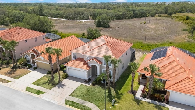 301 Rosso Dr, Davenport, FL 33837 - bird's eye view featuring a view of trees