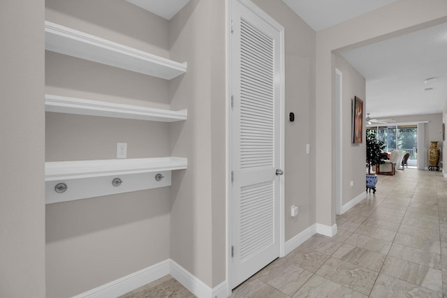 2487 Empress Dr, Kissimmee, FL 34741 - corridor with baseboards and marble finish floor