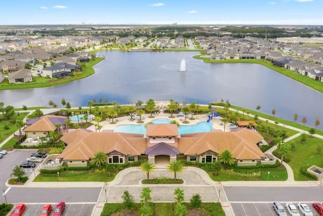 2487 Empress Dr, Kissimmee, FL 34741 - drone / aerial view with a water view and a residential view
