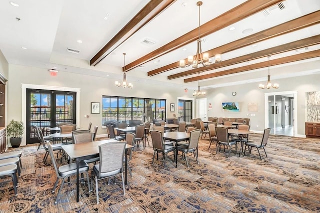 2487 Empress Dr, Kissimmee, FL 34741 - carpeted dining area with recessed lighting, an inviting chandelier, beam ceiling, and visible vents