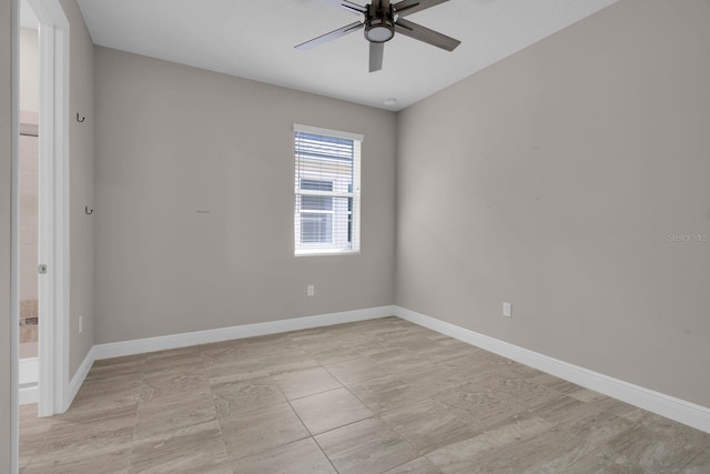 2487 Empress Dr, Kissimmee, FL 34741 - unfurnished room with baseboards and ceiling fan