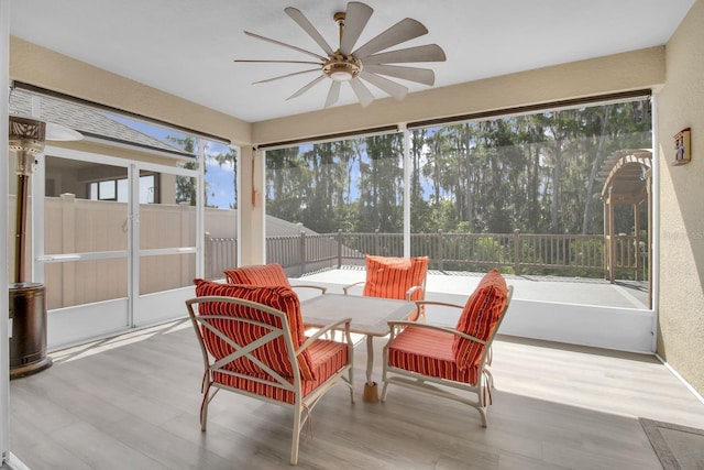 2487 Empress Dr, Kissimmee, FL 34741 - sunroom / solarium with plenty of natural light, ceiling fan, and outdoor dining area