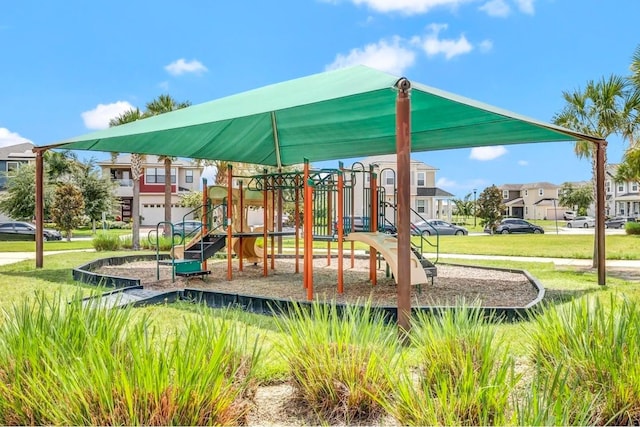 2487 Empress Dr, Kissimmee, FL 34741 - community jungle gym featuring a yard
