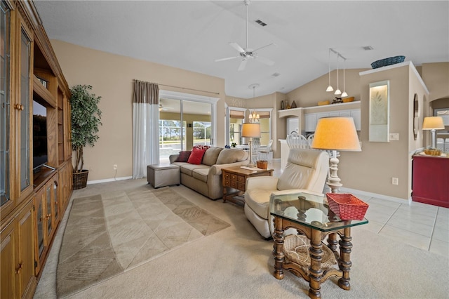living area with lofted ceiling, a ceiling fan, baseboards, and light carpet