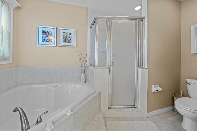 bathroom with a shower stall, toilet, tile patterned flooring, and a garden tub