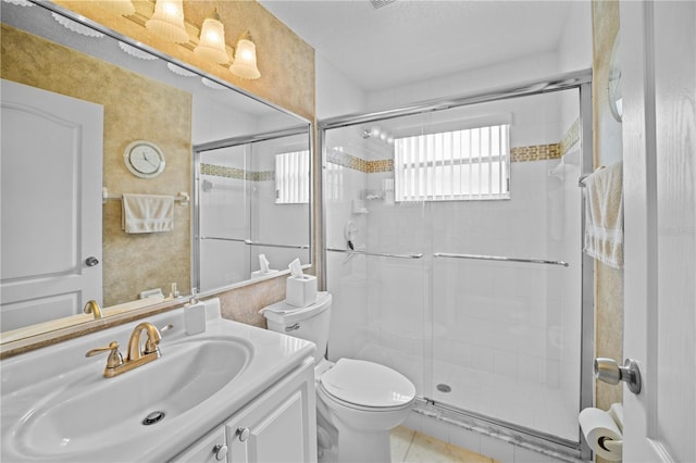 full bath featuring tile patterned floors, a shower stall, toilet, and vanity