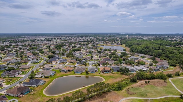 bird's eye view featuring a residential view and a water view