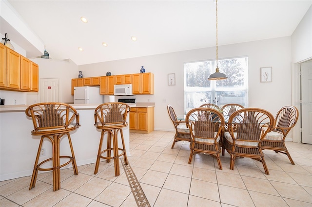 dining area featuring light tile patterned flooring, baseboards, recessed lighting, and lofted ceiling