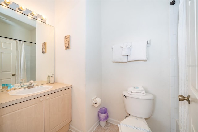 bathroom featuring vanity, tile patterned floors, toilet, and curtained shower