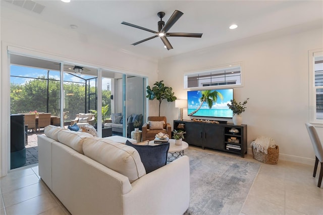 living room featuring recessed lighting, light tile patterned floors, a ceiling fan, visible vents, and baseboards