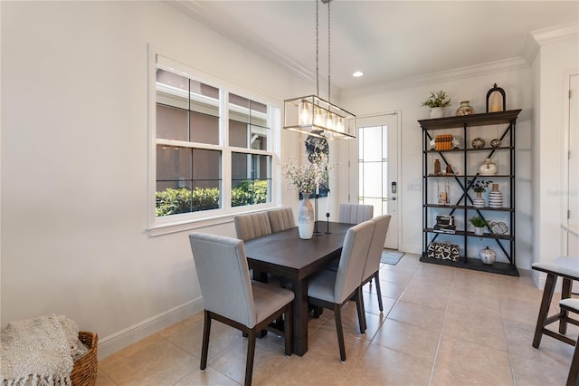 dining area with baseboards, recessed lighting, light tile patterned flooring, and crown molding