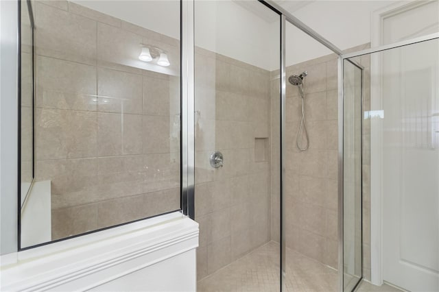 full bathroom with a stall shower