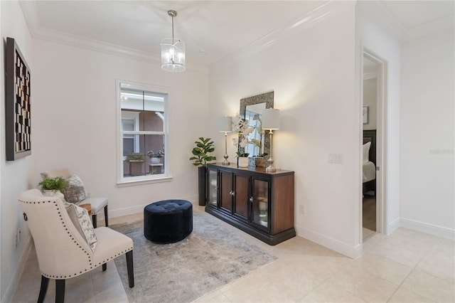 living area with tile patterned floors, crown molding, and baseboards
