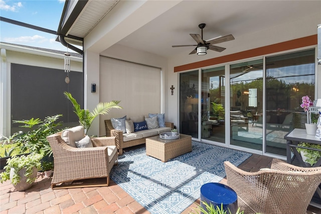 view of patio featuring an outdoor living space and a ceiling fan