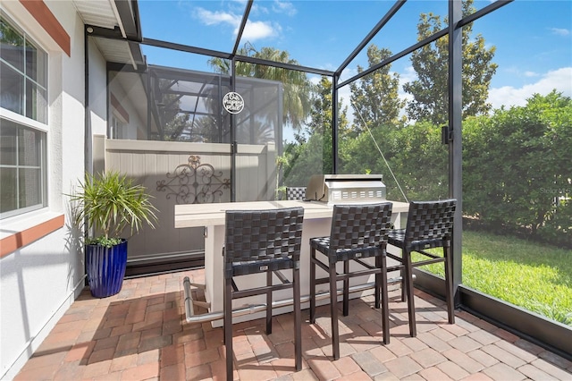 sunroom with an outdoor kitchen