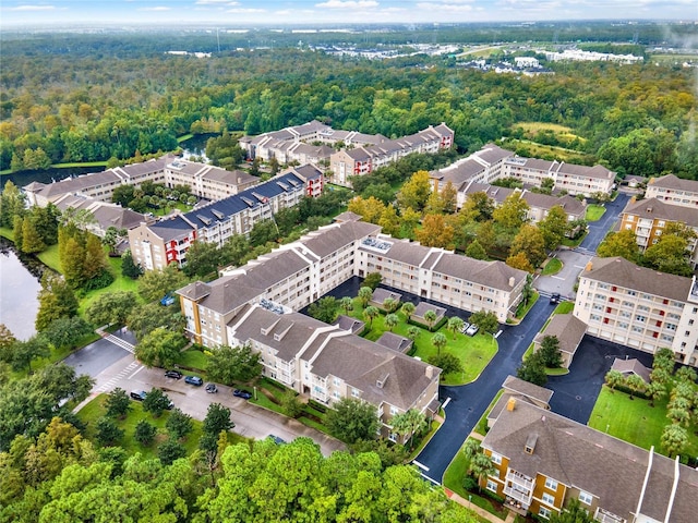 bird's eye view with a forest view