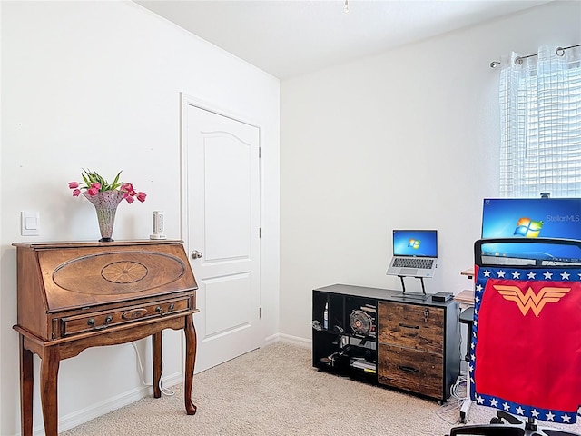 office with carpet flooring and baseboards