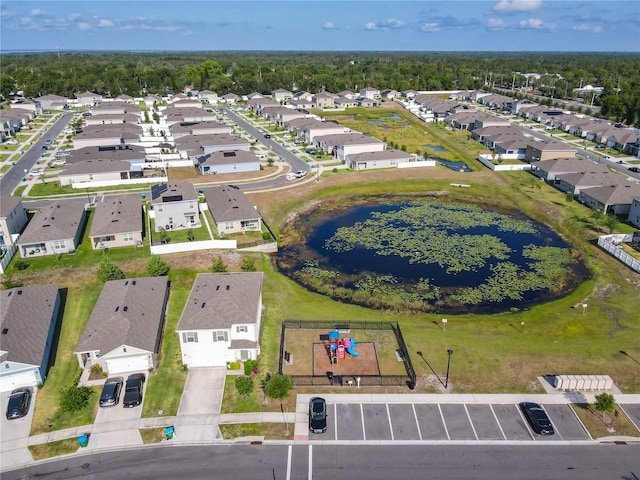 aerial view featuring a residential view and a water view