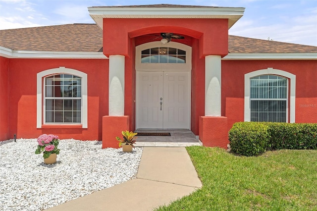 318 Highland Meadows Dr, Davenport, FL 33837 - entrance to property with a shingled roof and stucco siding