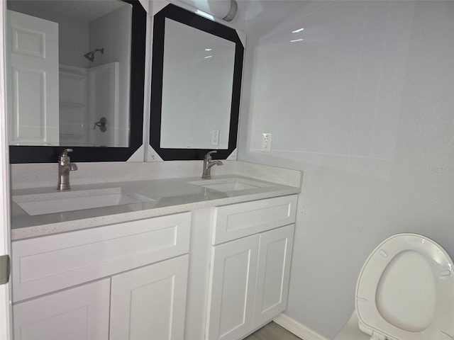 346 NW 24th Ave, Ocala, FL 34475 - bathroom featuring walk in shower, double vanity, and a sink