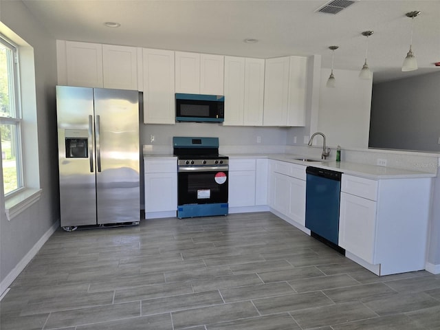 346 NW 24th Ave, Ocala, FL 34475 - kitchen featuring visible vents, plenty of natural light, appliances with stainless steel finishes, and a sink