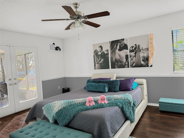 bedroom with french doors, ceiling fan, wood finished floors, and access to outside