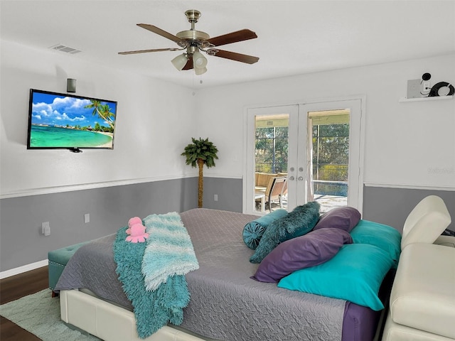 bedroom featuring visible vents, wood finished floors, ceiling fan, access to outside, and french doors