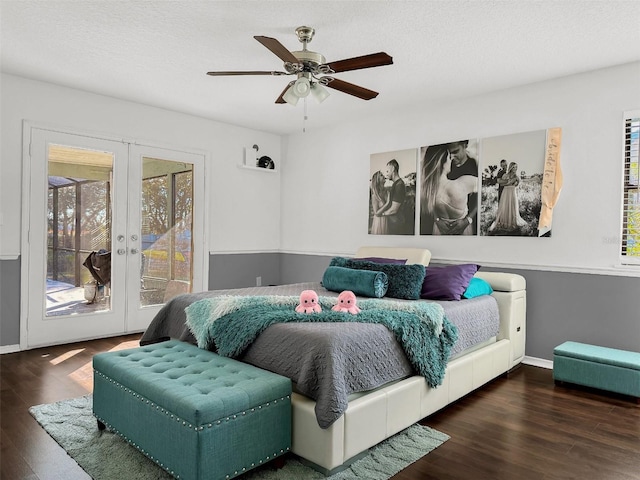 bedroom featuring access to outside, baseboards, wood finished floors, and french doors