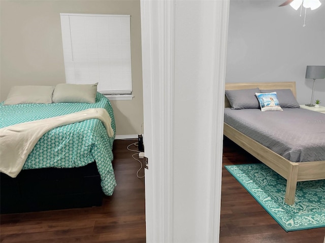 bedroom featuring a ceiling fan and wood finished floors