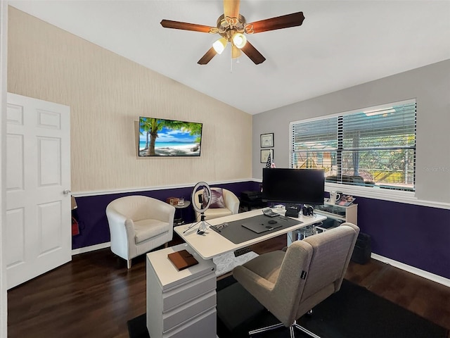 office featuring ceiling fan, baseboards, wallpapered walls, wood finished floors, and vaulted ceiling