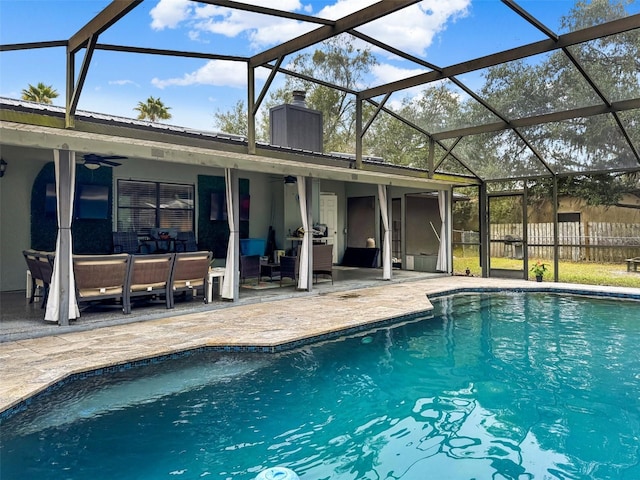 view of swimming pool with fence, an outdoor hangout area, ceiling fan, a fenced in pool, and a patio