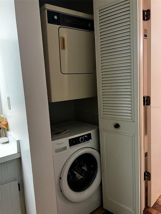 2659 Crown Ct Unit 11, Kissimmee, FL 34741 - washroom featuring stacked washing maching and dryer and laundry area