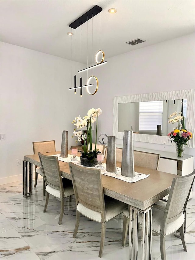 dining room with recessed lighting, marble finish floor, visible vents, and baseboards