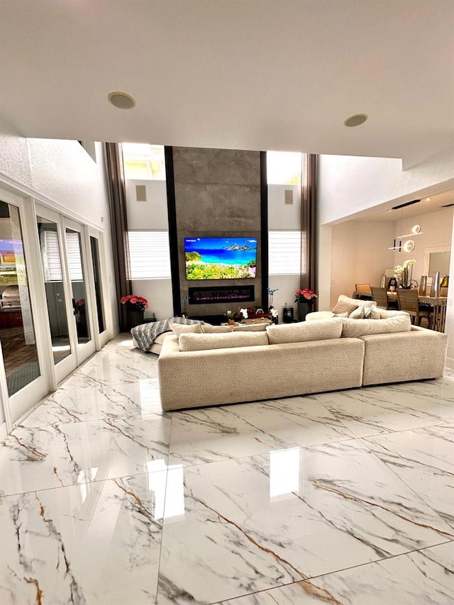 living room with marble finish floor