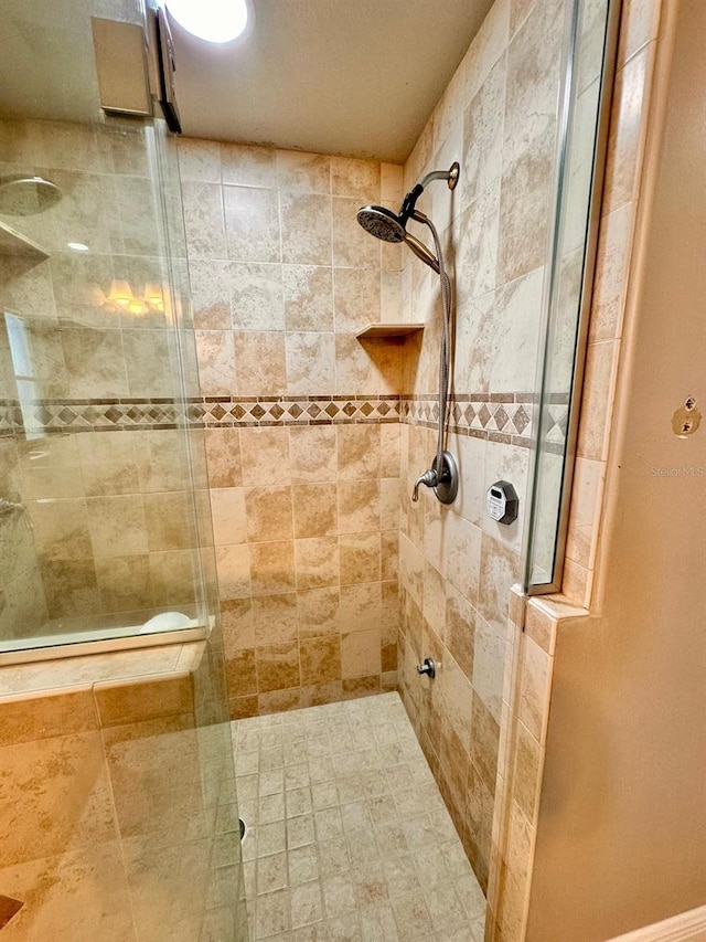 full bathroom with a shower stall