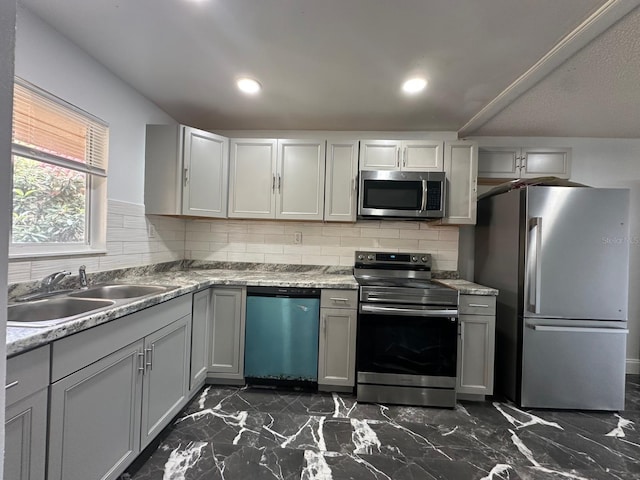 kitchen featuring decorative backsplash, a sink, stainless steel appliances, recessed lighting, and marble finish floor