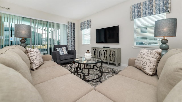 living room featuring baseboards