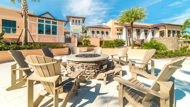 view of patio / terrace featuring a fire pit