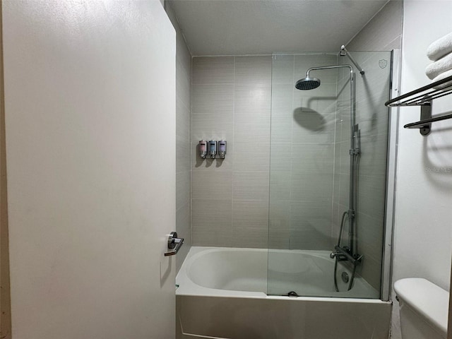 5245 W Irlo Bronson Memorial Hwy Unit 210, Kissimmee, FL 34746 - bathroom featuring toilet and bathtub / shower combination