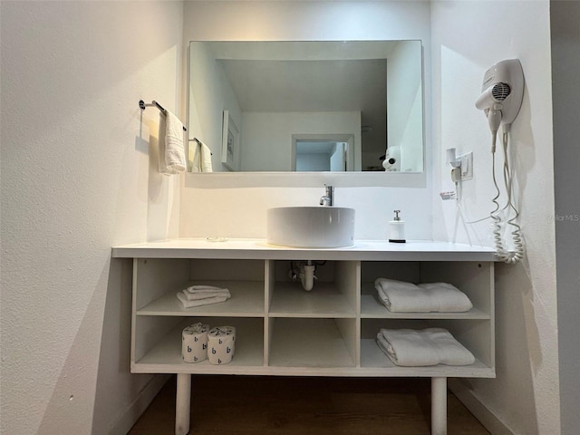 5245 W Irlo Bronson Memorial Hwy Unit 210, Kissimmee, FL 34746 - bathroom with vanity and baseboards