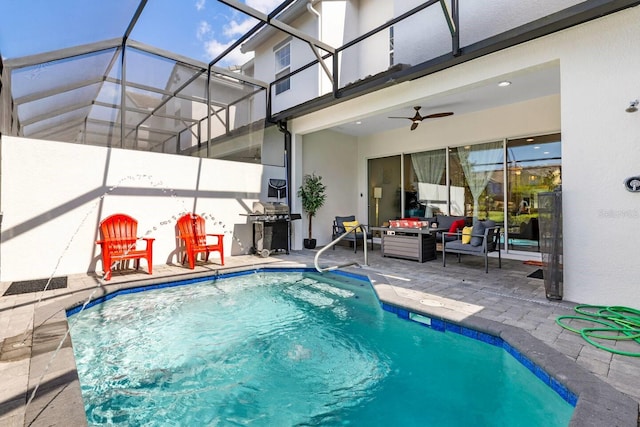 313 Captiva Dr, Davenport, FL 33896 - swimming pool with a patio, outdoor lounge area, glass enclosure, grilling area, and a ceiling fan