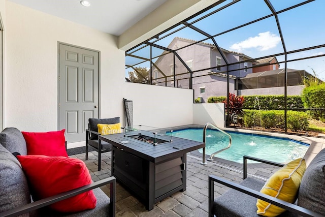313 Captiva Dr, Davenport, FL 33896 - view of patio / terrace with an outdoor pool, glass enclosure, and an outdoor living space with a fire pit