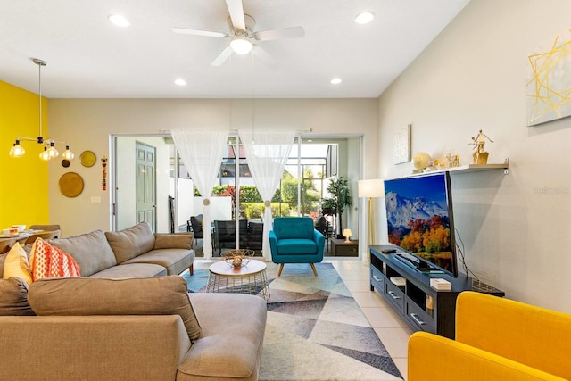 313 Captiva Dr, Davenport, FL 33896 - living room featuring light tile patterned floors, recessed lighting, and a ceiling fan