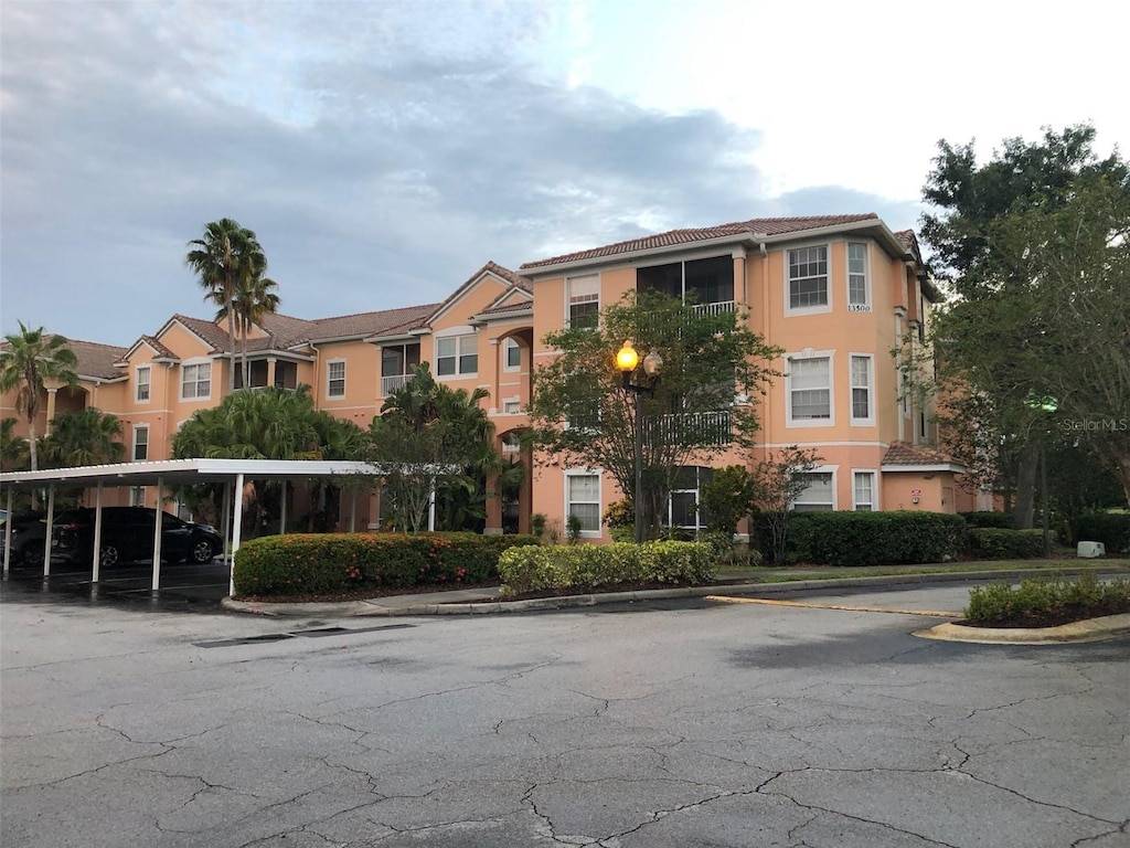 view of property with covered parking