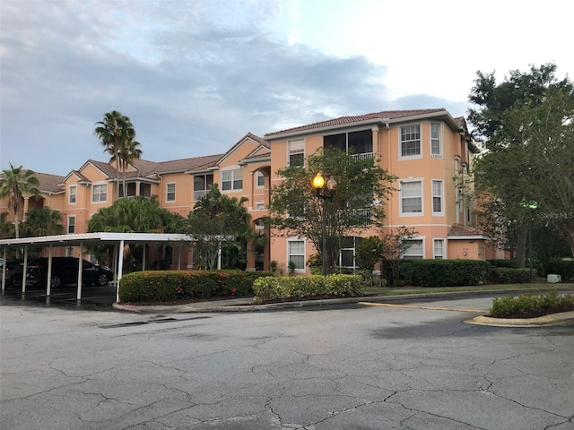 view of property with covered parking