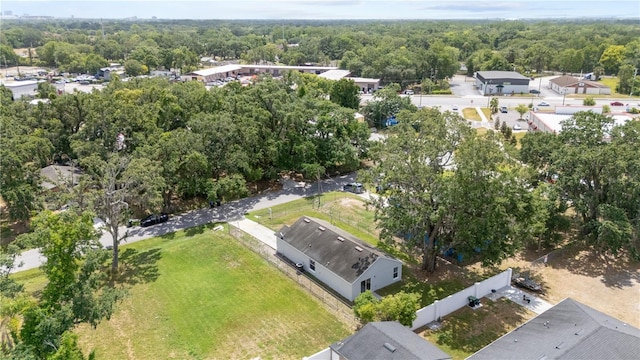 drone / aerial view featuring a forest view